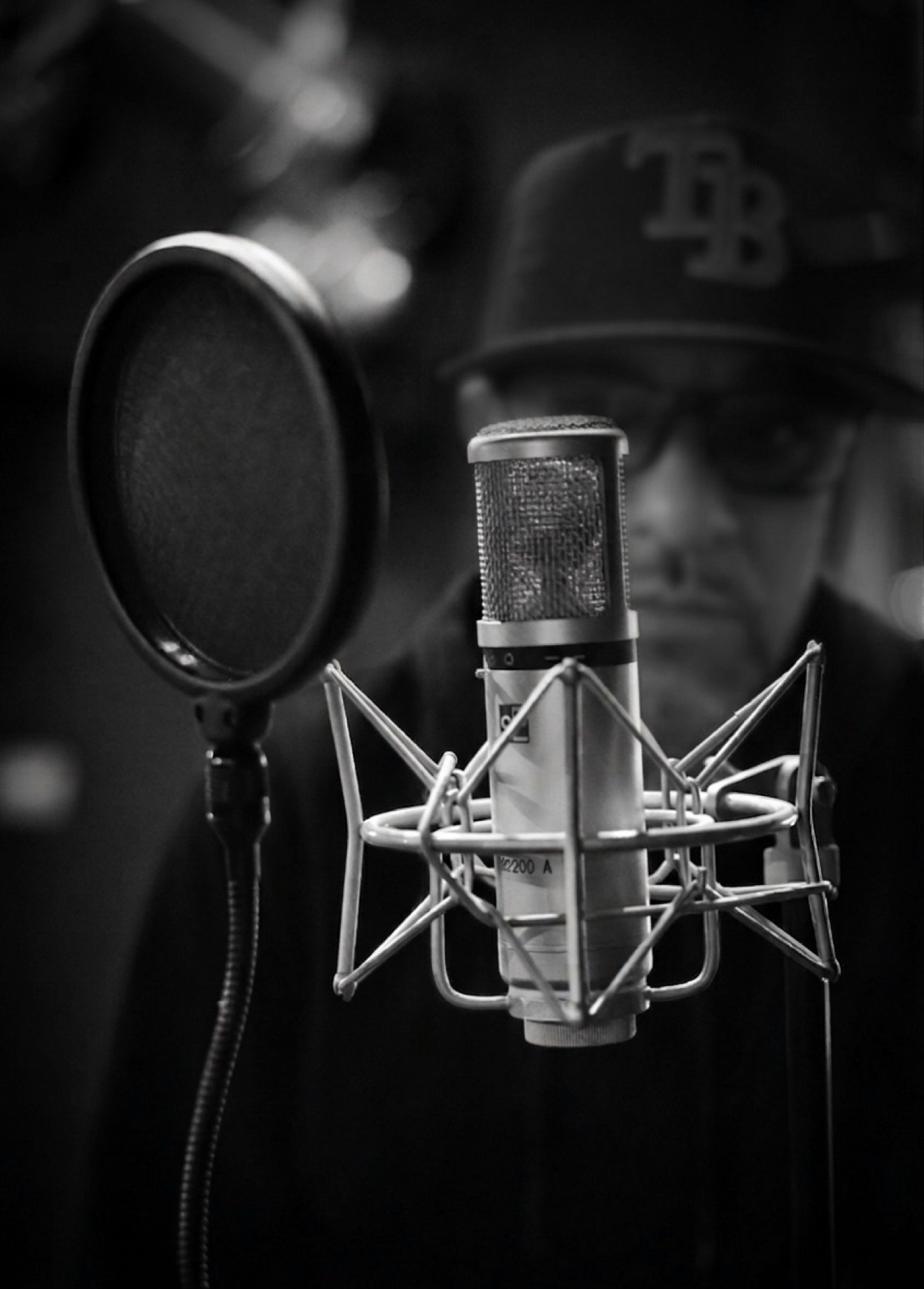 Evolve at the mic in the studio